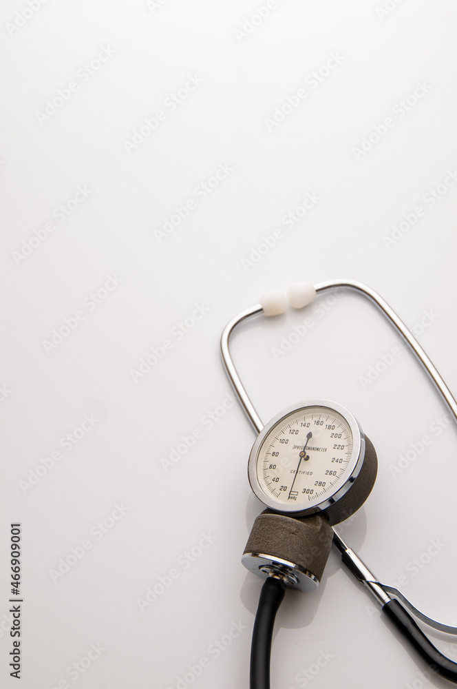 Stethoscope on white table at doctors surgery. white copy space Stethoscope on white table at doctors surgery. white copy space