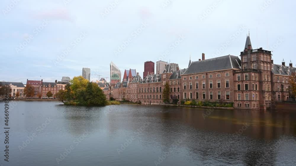 Den Hague, Netherlands. The Binnenhof complex in the city centre of The Hague, Holland. Gothic castle and lake. Den Hague, Netherlands. The Binnenhof complex in the city centre of The Hague, Holland. Gothic castle and lake.
