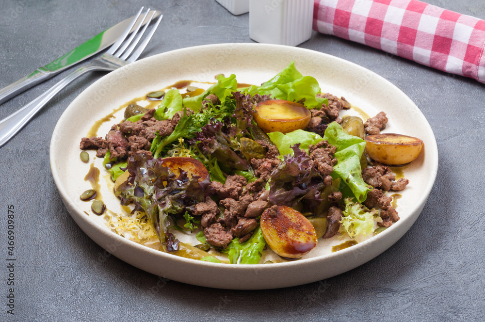 warm salad with potatoes, liver and pickled cucumber warm salad with potatoes, liver and pickled cucumber