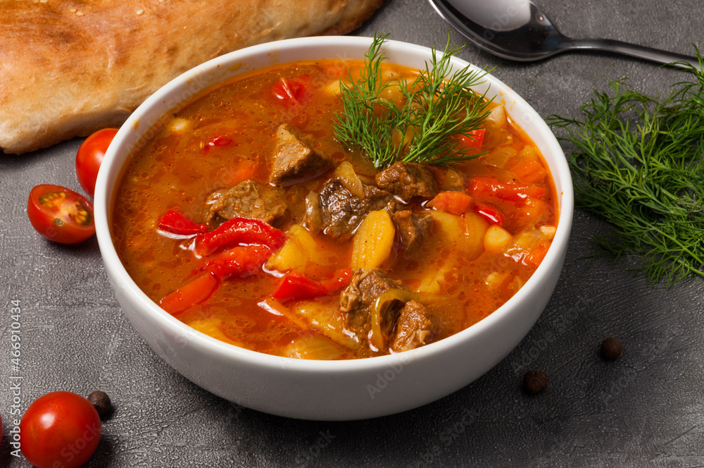 mastava is a traditional Uzbek soup in a white bowl mastava is a traditional Uzbek soup in a white bowl