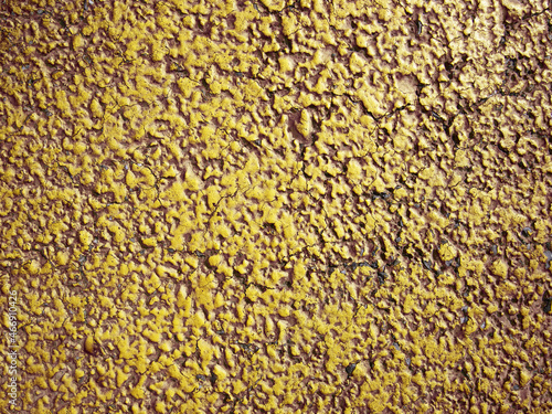 tarred surface painted with yellow paint background texture