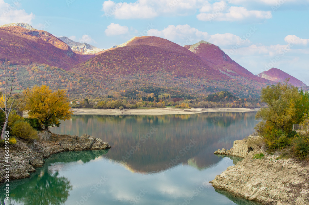 Lake Barrea, Italy - embedded in the wonderful Abruzzo, Lazio and Molise National Park, Lake Barrea is one of the most spectacular lakes of the Apennine Mountains, expecially during Autumn foliage