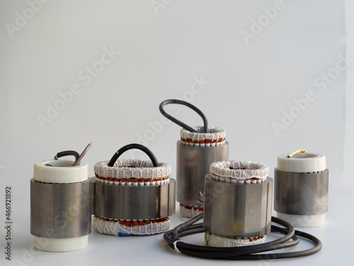 Precision motors fabrication concept. Set of copper coil of electrical stepper motor stators