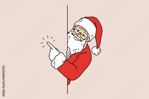New Year and Christmas coming concept. Santa in traditional red cap and bearded looking and pointing aside with finger vector illustration 