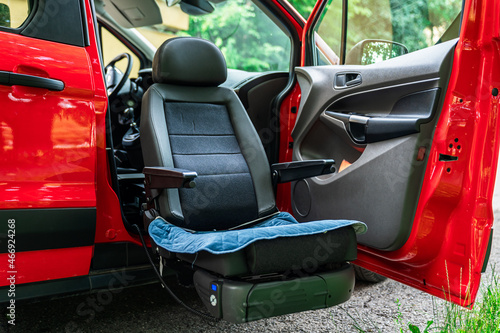 red car adapted for the disabled