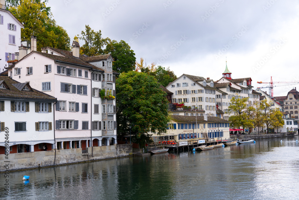 Old town of Zürich with river Limmat on a grey cloudy autumn day. Photo taken October 9th, 2021, Zurich, Switzerland.