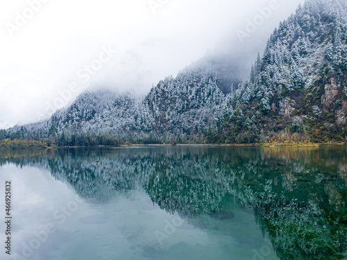 turquoise water at long sea during winter season photo