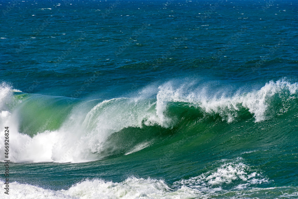 Strong wave breaking hard in the sea waters of Ipanema beach in Rio de Janeiro Strong wave breaking hard in the sea waters of Ipanema beach in Rio de Janeiro