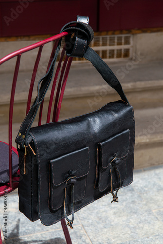 close-up photo of black leather bag corporate.