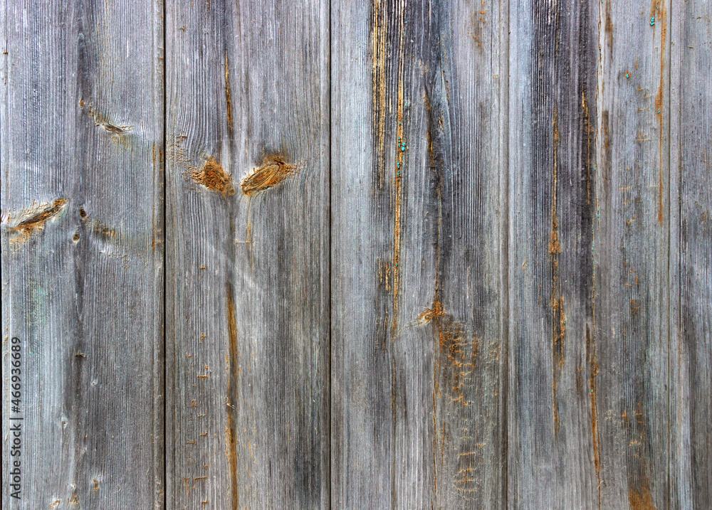 Old grey and blue wooden background with cracks and scratches in vintage style Old grey and blue wooden background with cracks and scratches in vintage style