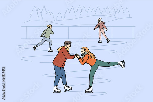 Active leisure in winter concept. Young happy smiling couple skating together on rink holding hands having fun vector illustration 