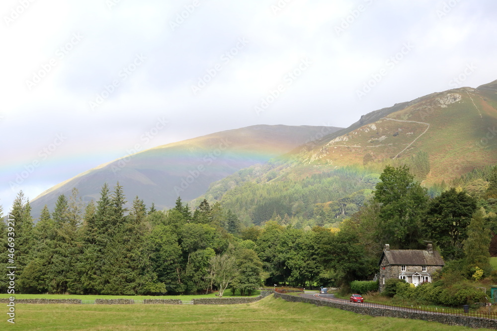 Rainbow in Grasmere. Lake District rain brings beautiful rainbow to the Grasmere area of the Lake District National Park. Rainbow in Grasmere. Lake District rain brings beautiful rainbow to the Grasmere area of the Lake District National Park.