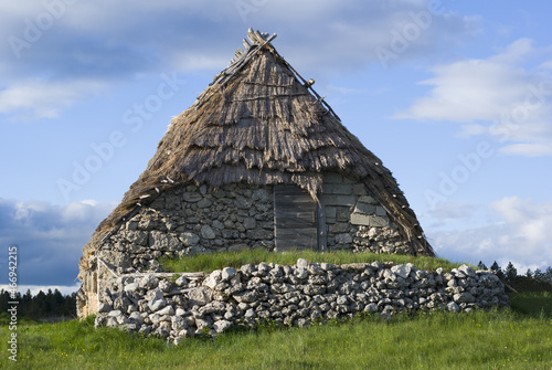 Old straw house residence photo