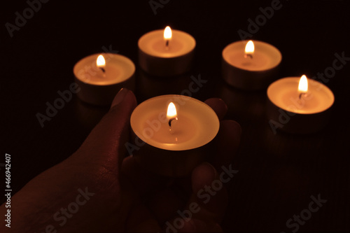 Tea light candles in the dark.