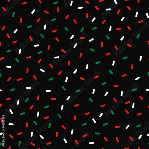 Seamless Christmas pattern. colored confetti on a black background. vector texture. fashionable print for textiles, postcards and packaging.