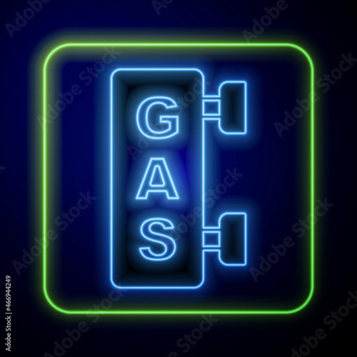 Glowing neon Gas filling station icon isolated on blue background. Transport related service building Gasoline and oil station. Vector