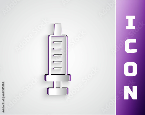 Paper cut Syringe icon isolated on grey background. Syringe for vaccine, vaccination, injection, flu shot. Medical equipment. Paper art style. Vector