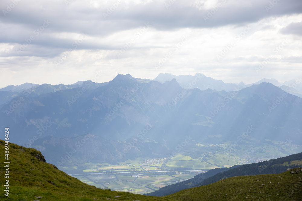 Fototapeta premium Amazing hiking day in one of the most beautiful area in Switzerland called Pizol in the canton of Saint Gallen. What a wonderful landscape in Switzerland at a sunny day. Beautiful alpine lake.