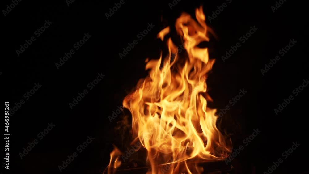 flames of fire on a black background in hell. hot fire burns hot. energy flammable concept. warm light spark of fire hazard gasoline effect flames of fire on a black background in hell. hot fire burns hot. energy flammable concept. warm light spark of fire hazard gasoline effect