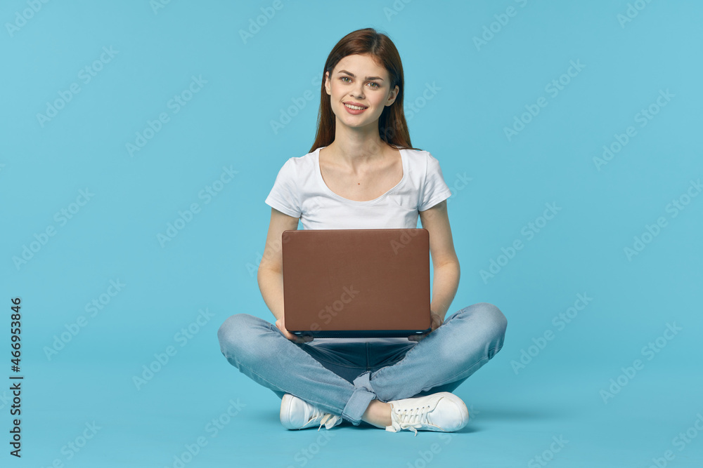 woman with laptop sitting on the floor learning student technology woman with laptop sitting on the floor learning student technology