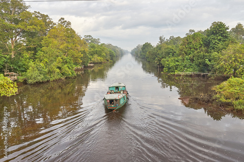 Goods Ship along the Kapuas River, delivering daily needs, for the Dayak Tribe. photo