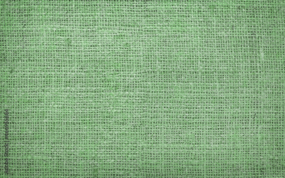 Fototapeta premium Green canvas texture with real linen threads on canvas with beautiful linen texture on canvas as sample of green linen canvas