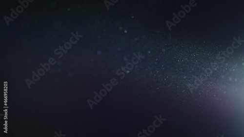 Natural Dust Organic Floating particles in stage light ray (spot) on black background. Dust in air atmosphere for your projects! Just drop it over your footage and use blending (screen) mode.