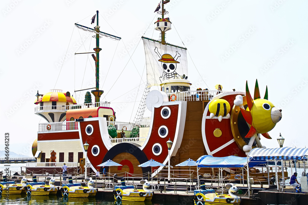 Nagasaki, Japan - May 13, 2013 : Thousand Sunny ship from Anime cartoon One  Piece at pier for
