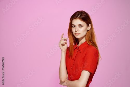 woman red dress posing fun fashion pink background © SHOTPRIME STUDIO
