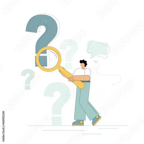 Question concept. A man holds a magnifying glass and examines through it at points of questioning