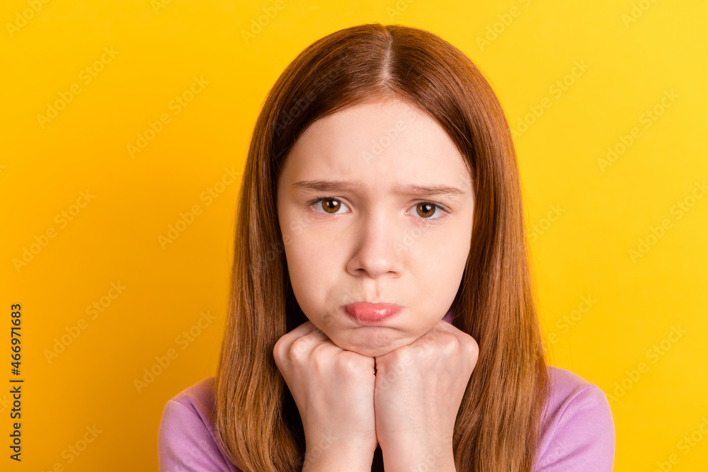 Photo of young negative mood upset unhappy little girl feel lonely crying isolated on yellow color background