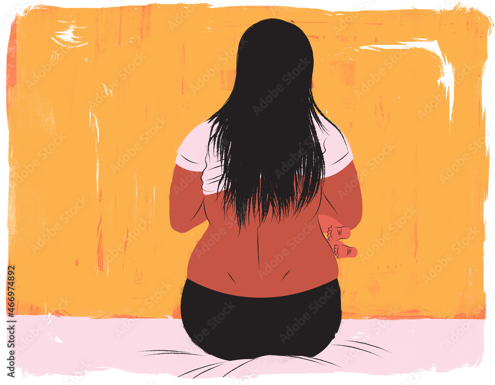 Woman breastfeeding her baby with baby's feet visible Stock