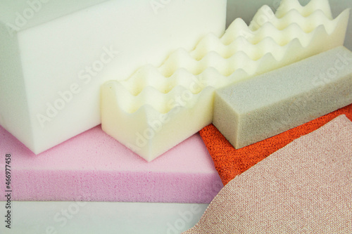a piece of foam rubber of different sizes and colors, production of upholstered furniture.