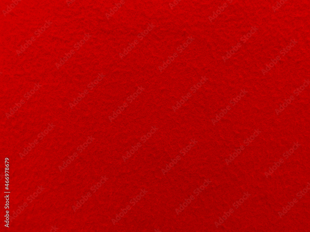 Felt red soft rough textile material background texture close up,poker table,tennis ball,table cloth. Empty red fabric background.