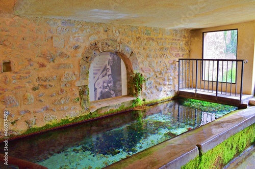 Ancient wash house in the medieval village of Rasiglia fraction of Foligno, Perugia, Italy photo