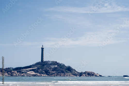 Copy space sea nature landscape background. Nature reserve park, harbour bay, rocks coast, lighthouse on island mountain top. Sun day clear azure sky blue ocean. Trip vacation travel. Pale tone
