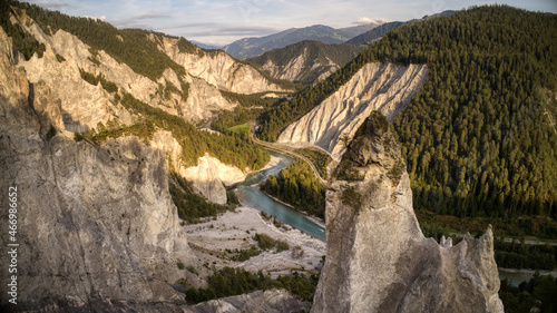 the rhine river seen from behind a pinnacle on an autumn day