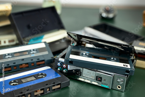 Cassette player and various cassette tapes with their boxes