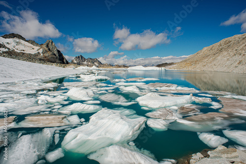 icebergs in the lake of the Chüebodenhorn in Switzerland summer