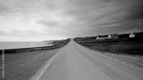 Roads and farms by the sea.