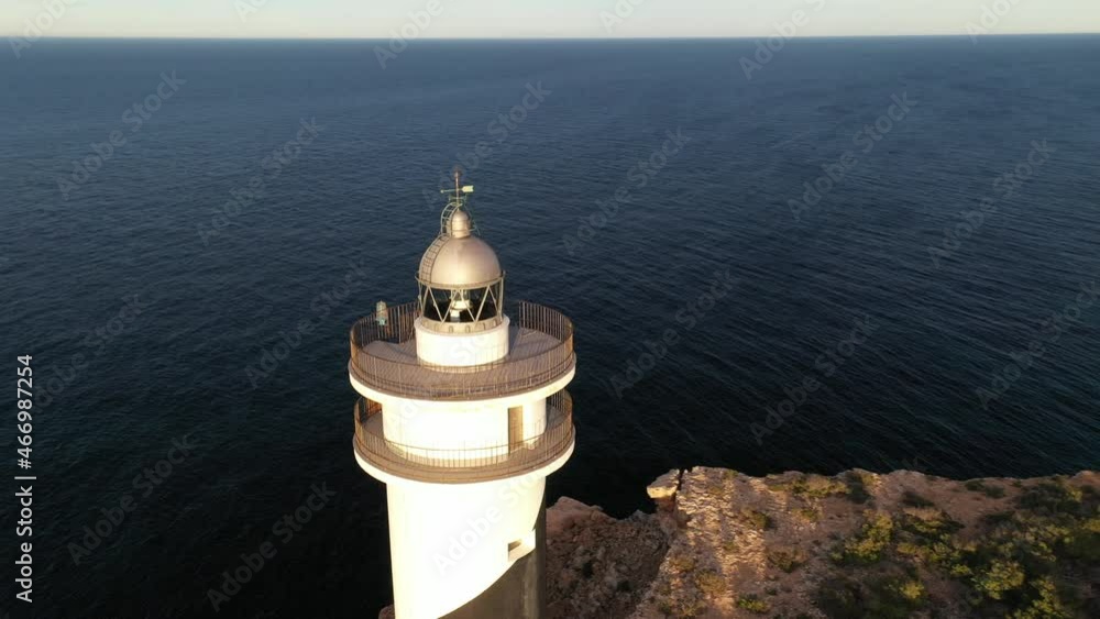 Aerial video of the Moscarter lighthouse, in Portinatx, a town in the north of the island of Ibiza. Aerial video of the Moscarter lighthouse, in Portinatx, a town in the north of the island of Ibiza.