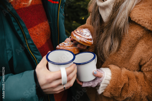 Cute Couple Having Winter Forest Picnic Drinking Tea from Tea Cup Eating Sweet Buns. Nature Picnic. Love Story Date at Car. Close Up Portrait