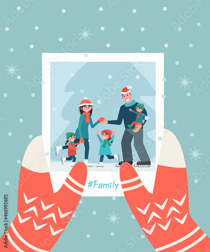 A photograph with a family in hand. Winter Christmas concept. Family photo on a background of snowflakes. Vector illustration in a flat style.