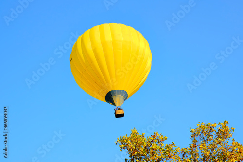 take-off of the flight of some aerostatic balloons for tourist use. photo