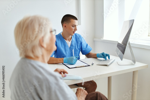 a patient at a doctor's appointment professional consultant