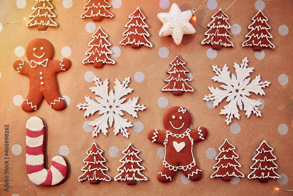 Christmas homemade gingerbread cookies pattern. Homemade baking background. Festive card with aesthetic Christmas atmosphere. Merry Christmas and home coziness concept