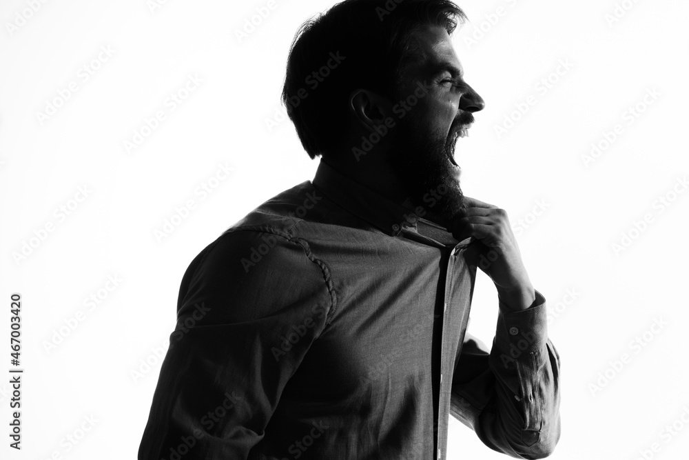 Man with a pistol in hand crime hand gesture light background Man with a pistol in hand crime hand gesture light background