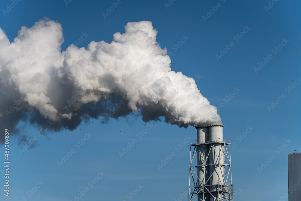 CO2 emissions from a chimney of a fossil fuel (coal) power station.