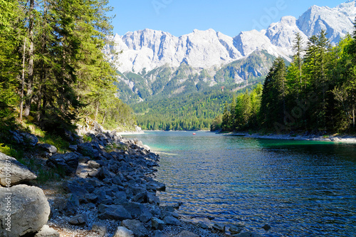Fototapeta Naklejka Na Ścianę i Meble -  picturesque turquois alpine lake Eibsee (yew lake) by the foot of mountain Zugspitze in Bavaria (the German Alps, Garmisch-Partenkirchen, Grainau, Bavaria, Germany)		
