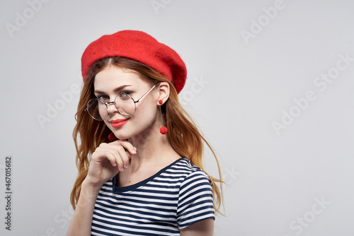 Frenchwoman wearing glasses posing fashion attractive look red earrings jewelry lifestyle